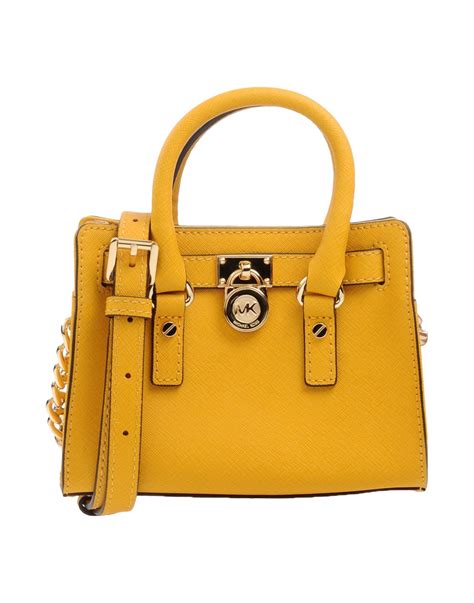 michael kors bag yellow and khaki|michael kors yellow shoulder bag.